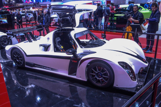 Illustration for article titled Track Fight: The SCG003 vs. The RXC Turbo 500